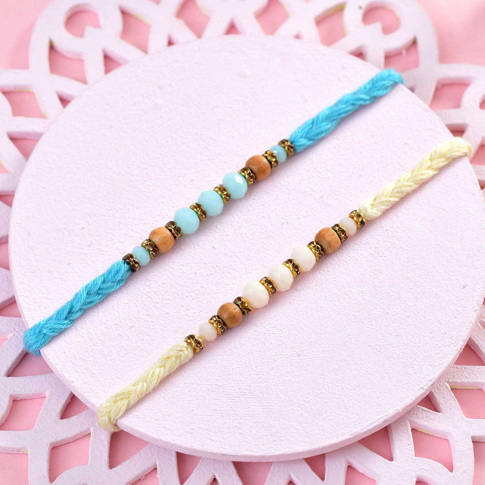 T4 Jewels Elegant Beaded Rakhi Set with Blue & Cream Threads – Minimal Rakhi for Kids & Brothers (Pack of 2) – SR10A