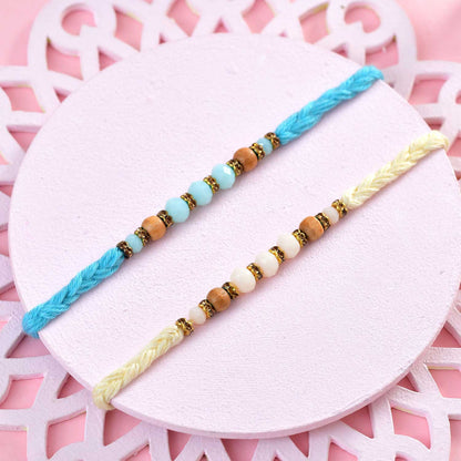 T4 Jewels Elegant Beaded Rakhi Set with Blue & Cream Threads – Minimal Rakhi for Kids & Brothers (Pack of 2) – SR10A