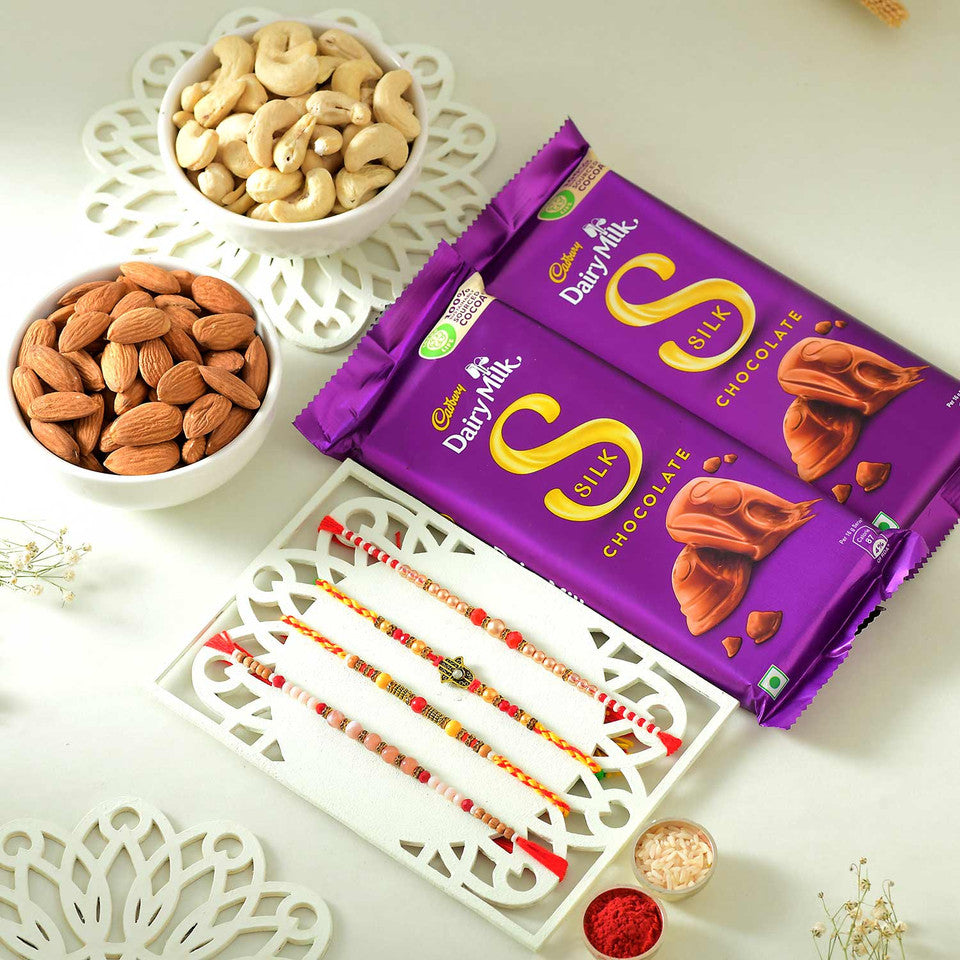 T4 ज्वेल्स प्रीमियम राखी सेट काजू, बादाम और डेयरी मिल्क सिल्क के साथ(2) 🍫 - SR24